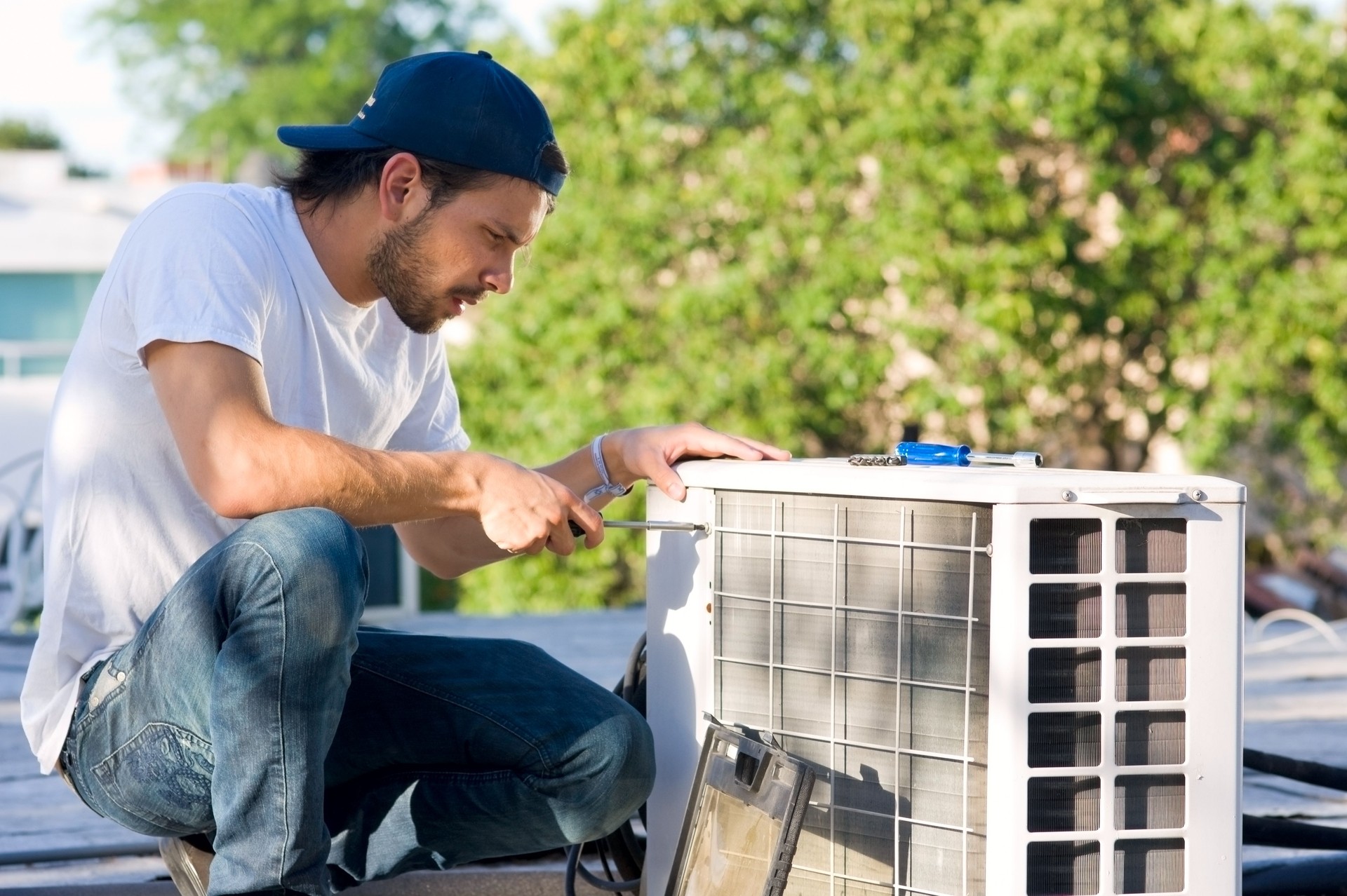 Serviceman with Heat Pump